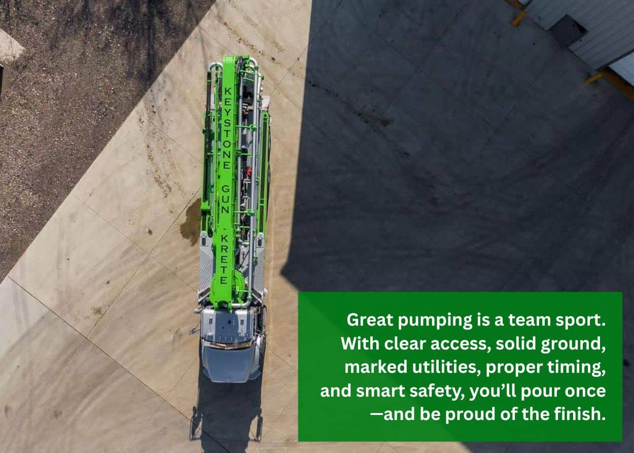 Top view of green concrete pumper truck driving on pavement